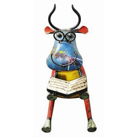 Cow Scholar by Think Outside - Who doesn’t like a friendly Scholar, particularly one so colourful and fun? This fantastic piece is sure to bring a smile to your face and quickly find a home in your garden.  Cow Scholar Garden Sculpture is handcrafted by skilled artisans and recycled from barrels. She adds a touch of personality to your home, is eco-friendly and looks great.  H 39 cm W 18.8cm L 37 cm