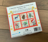 6 Assorted Illustrated Christmas Cards in Red Box by Popcorn Blue. back of box