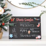 Dear Santa Chalkboard. Fill out in chalk the persons Name Age Wishlist, their favourite - thing about christmas, food and Movie. Last of all have they been naughty or nice. Lifestyle shot