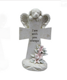 Dog memorial cross with a winged dog over the cross with flowers below,. The saying on the cross - I am with you always”.