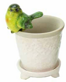 Small Green Bird pot hanger made from Resin. Great to dress up any pot inside or out.