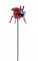 Garden Friends - Lady Beetle base of body is red with wings red with black dots. Head is black and also the antenni with red dots on top. Eyes are white and black. Stake 50cm 