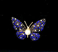 Butterfly Brooch with Pearl body, wings with Blue and white stones