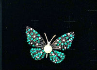 Butterfly Brooch with Pearl body, wings with Green and white stones