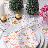 Christmas Lifestyle shot of christmas table with runner napkins and napkin holders