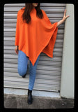 Bright Orange Coloured -  Beautiful Ponchos, cosy and warm for mid session wear or inside cooler areas. Made from 50% wool and 50% Viscose. Great colours that will match all colours.