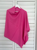 Candy Pink Coloured - Beautiful Ponchos, cosy and warm for mid session wear or inside cooler areas. Made from 50% wool and 50% Viscose. Great colours that will match all colours.