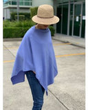 Mauve Coloured - Beautiful Ponchos, cosy and warm for mid session wear or inside cooler areas. Made from 50% wool and 50% Viscose. Great colours that will match all colours.