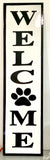  WELCOME sign in Black and White with paw print made in Metal with enamel coating. Two screw hooks at top of frame. Painted front and back. Rustic in design.
