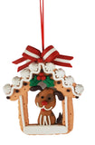 Dog in Gingerbread House Hanging Decoration.   Dimensions: H12.4cm x 10cm x 2 cm