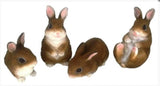 Beautiful Rabbits in different poses - Sitting Up, Laying Back, Down with head up, Down Sniffing.  Made of resin. Sold separately.