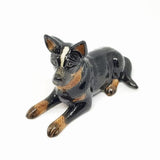 Cattle Dog Medium Laying, black/grey. Everyone loves a cattle dog, an Australian icon. There are 3 styles available.  As our Ceramic is hand blown and crafted, size, colour and markings may vary.  This figurine measures approx 5.3cm x 10cm x 9.5cm high.  Made in Thailand.