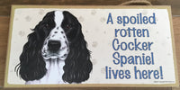 Sign with an image: A spoiled rotten Cocker Spaniel lives here! (Black & White Colour)