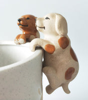 Ceramic Dog Pot Hanger two colours available, White with brown spots or Brown. Sold separately.  Dimension : H9 cm X 5cm X 6CM 