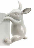 Beautiful resin Rabbit pot sitters. In White.  Dimensions 6cm L x 4.5 cm W x 9.5 cm H