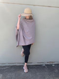 Taupe Beautiful Ponchos, cosy and warm for mid session wear or inside cooler areas. Made from 50% wool and 50% Viscose. Great colours that will match all colours.