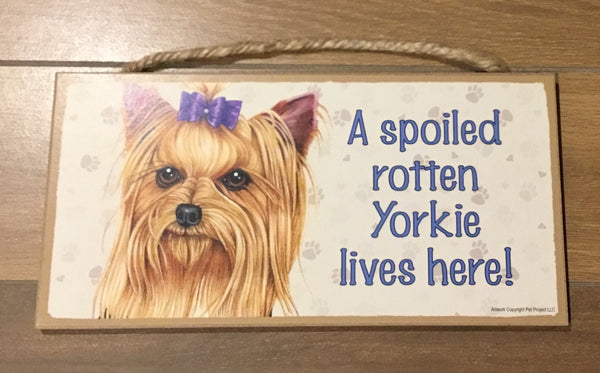 Sign and image - A spoiled rotten Yorkie lives here!