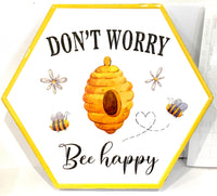 Beautiful hexagonal sign of Don’t Worry Bee Happy. With Flowers bees and a bee hive in the centre with a heart. Great for any bee lover or apiarist.  25cm x 21.5cm x 1.5cm