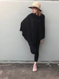 Black - Beautiful Ponchos, cosy and warm for mid session wear or inside cooler areas. Made from 50% wool and 50% Viscose. Great colours that will match all colours.