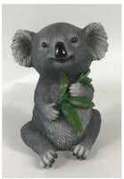 Native Koala with Gum leaf Figurine. Made from Polyresin.  Dimensions: 8.3cm x 7.2cm x 11.8cm