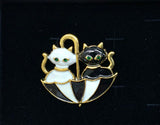 Beautiful Brooch of Black and White Cats in an Umbrella. Dimensions 4cm x 3.5cm