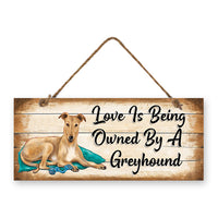 MDF Sign - Love is Being Owned by a Greyhound - Colour beigh and white