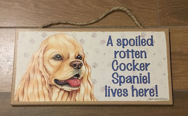 Sign with an image: A spoiled rotten Cocker Spaniel lives here! (Tan Colour)