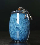 Blue Iced Glazed Cremation Urn - Ceramic cremation urn with fabric covered stopper for cremation remains of your beloved pet. Colours available in Pink, Blue or Cream Dimensions 13cm x 7.5cm x 6cm