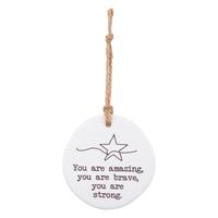 You are amazing. You are brave, you are stone. Tiny Treasures ceramic disc with rope hanging