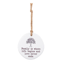 Family is where life begins and lover never ends. Tiny Treasures ceramic disc with rope hanging