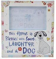 This house is blessed by love laughter and a dog