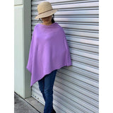Light Purple Coloured - Beautiful Ponchos, cosy and warm for mid session wear or inside cooler areas. Made from 50% wool and 50% Viscose. Great colours that will match all colours. 